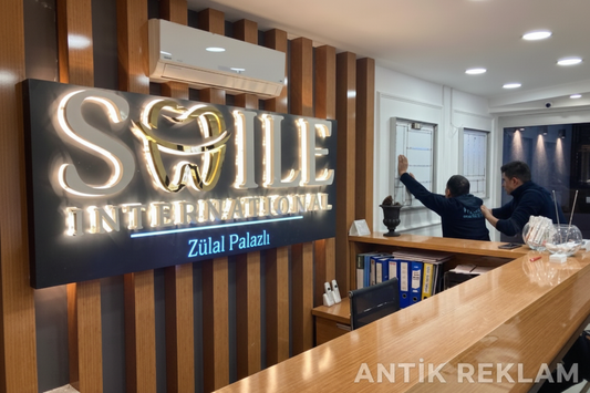Smile International gold paslanmaz kutu harf endirek aydınlatmalı diş kliniği resepsiyon tabelası